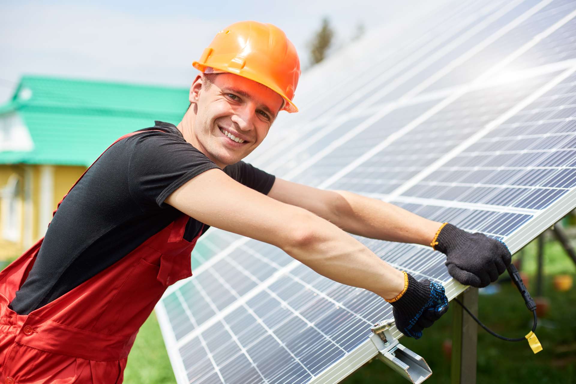 Man installing un mounted solar panels